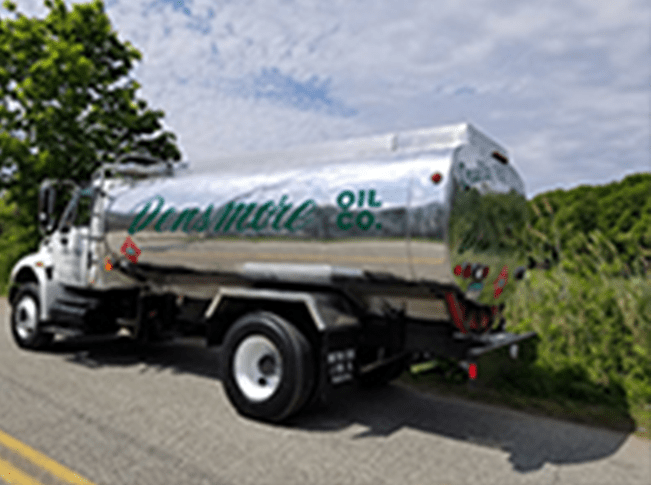 A stainless steel Densmore truck on the side of a ride