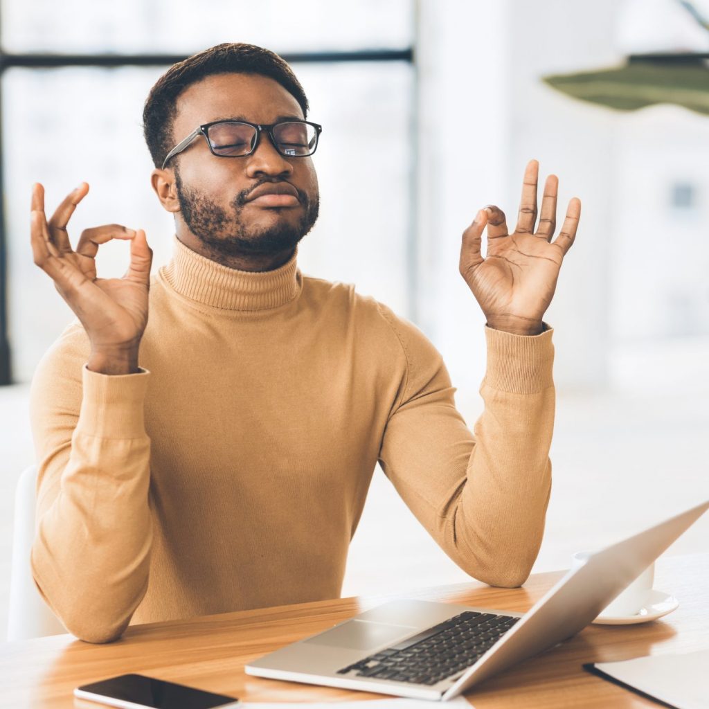 Calm man taking a financial check up test online on laptop